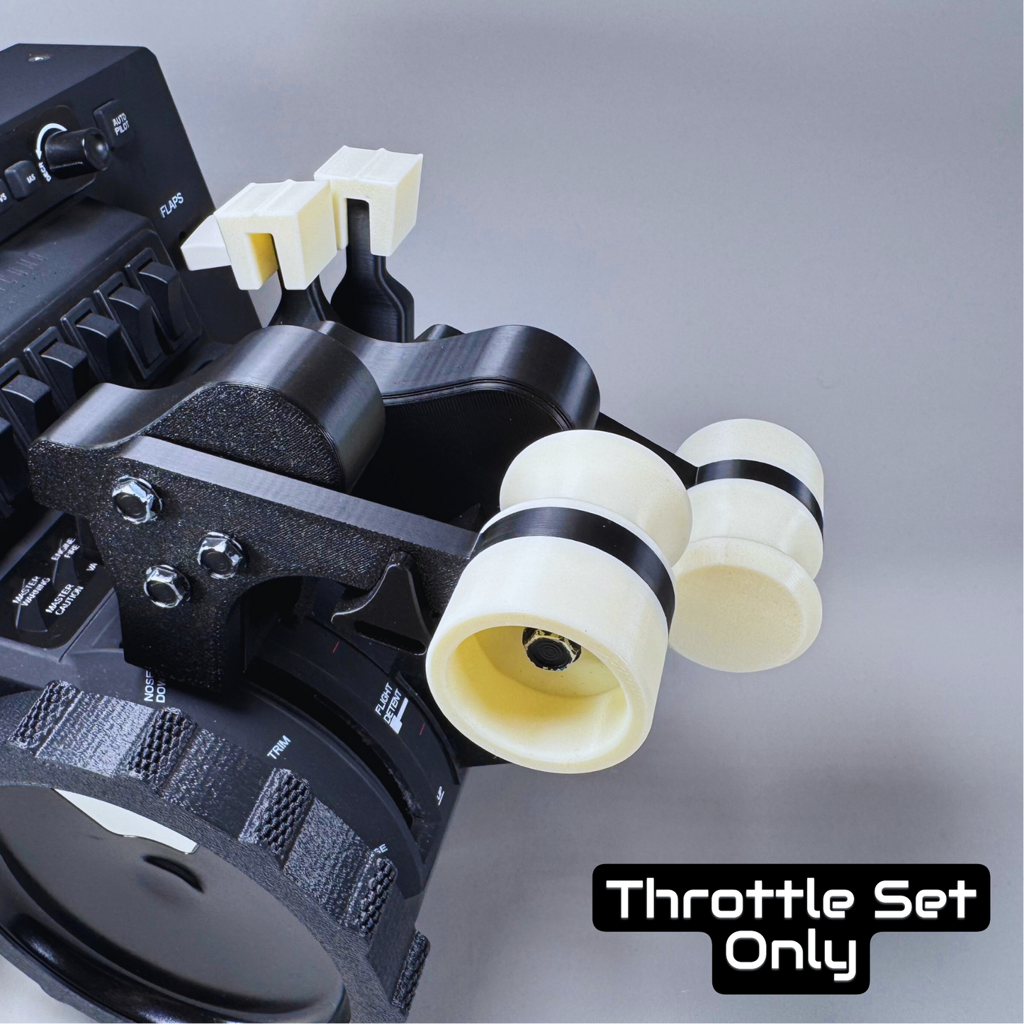 Throttle set with black and white components on a gray background
