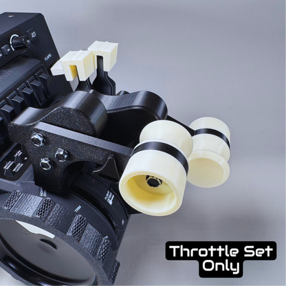Throttle set with black and white components on a gray background